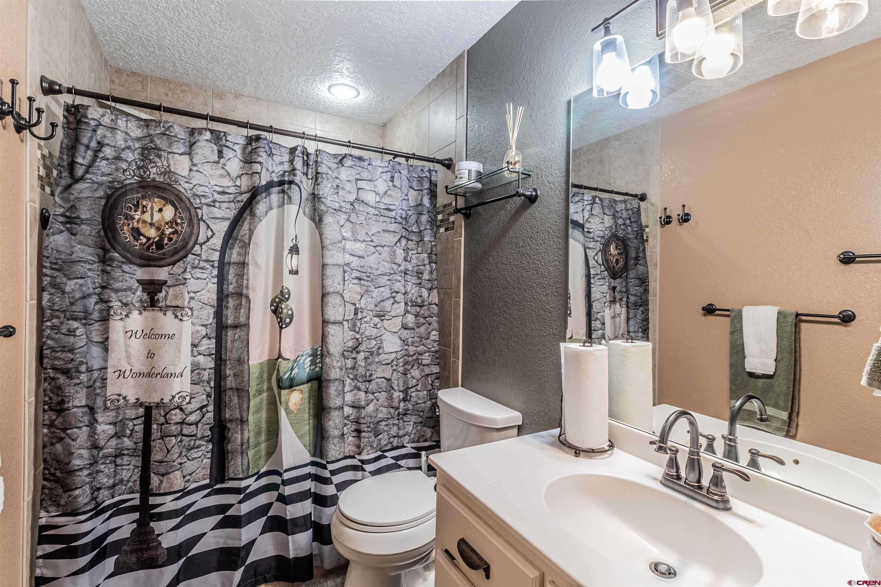 27 Road 3025 Aztec, NM 87410 - Photo 15 of 45 a bathroom with a sink toilet and shower