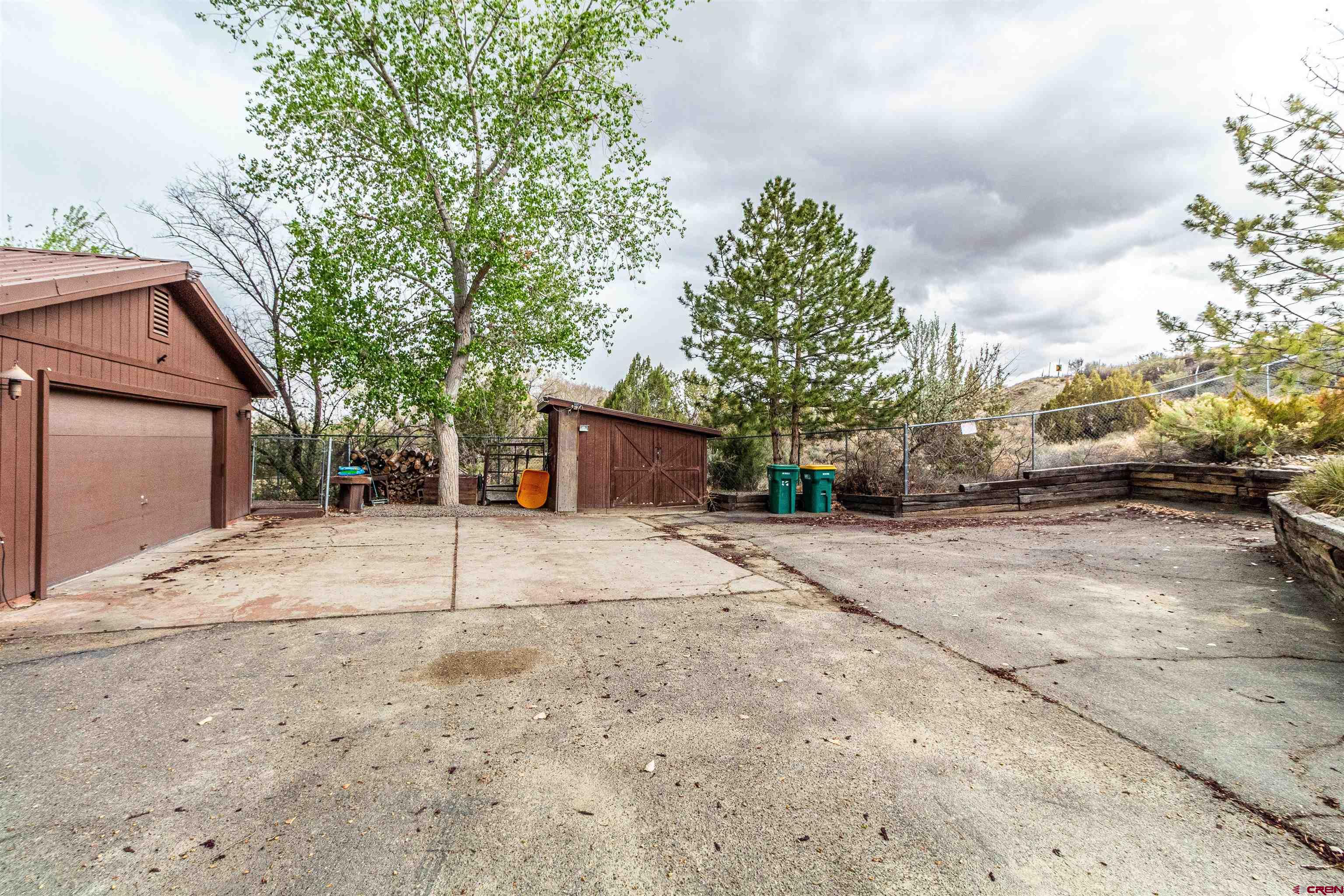 27 Road 3025 Aztec, NM 87410 - Photo 2 of 45 a view of a street with a building in the background