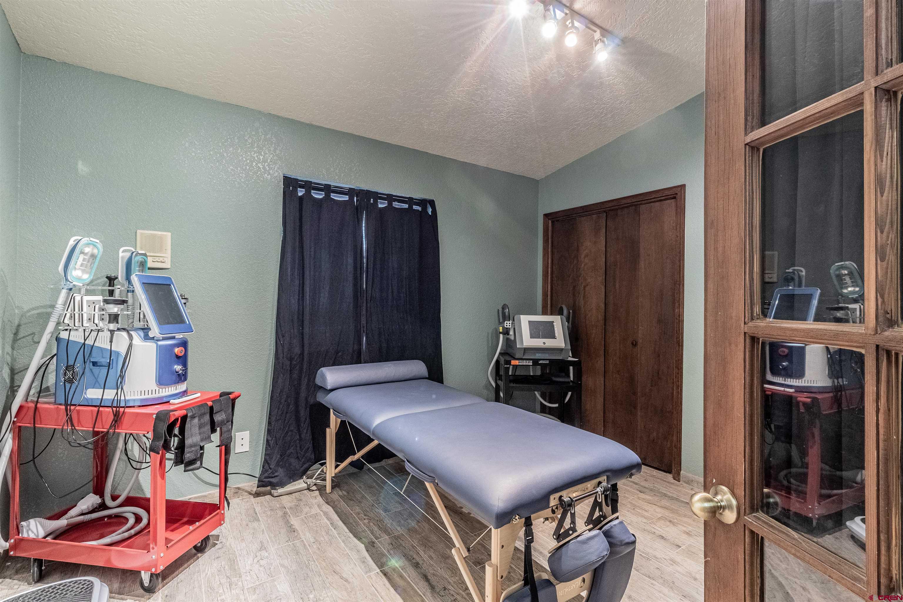 27 Road 3025 Aztec, NM 87410 - Photo 24 of 45 a view of a room with furniture and wooden floor