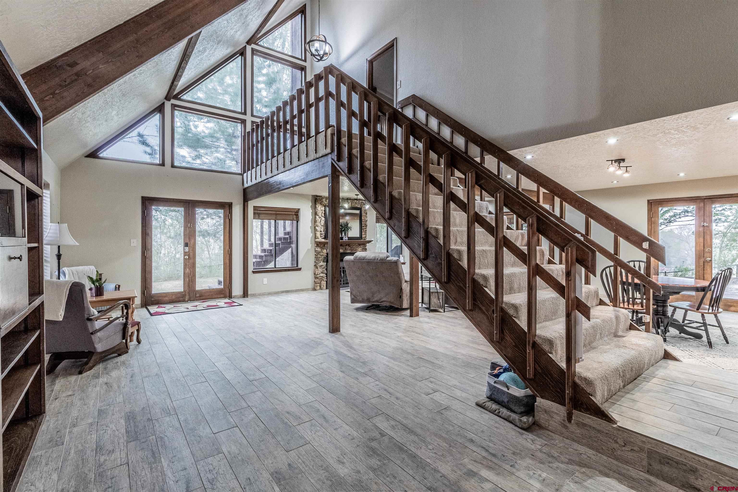 27 Road 3025 Aztec, NM 87410 - Photo 25 of 45 a view of entryway and hall with wooden floor
