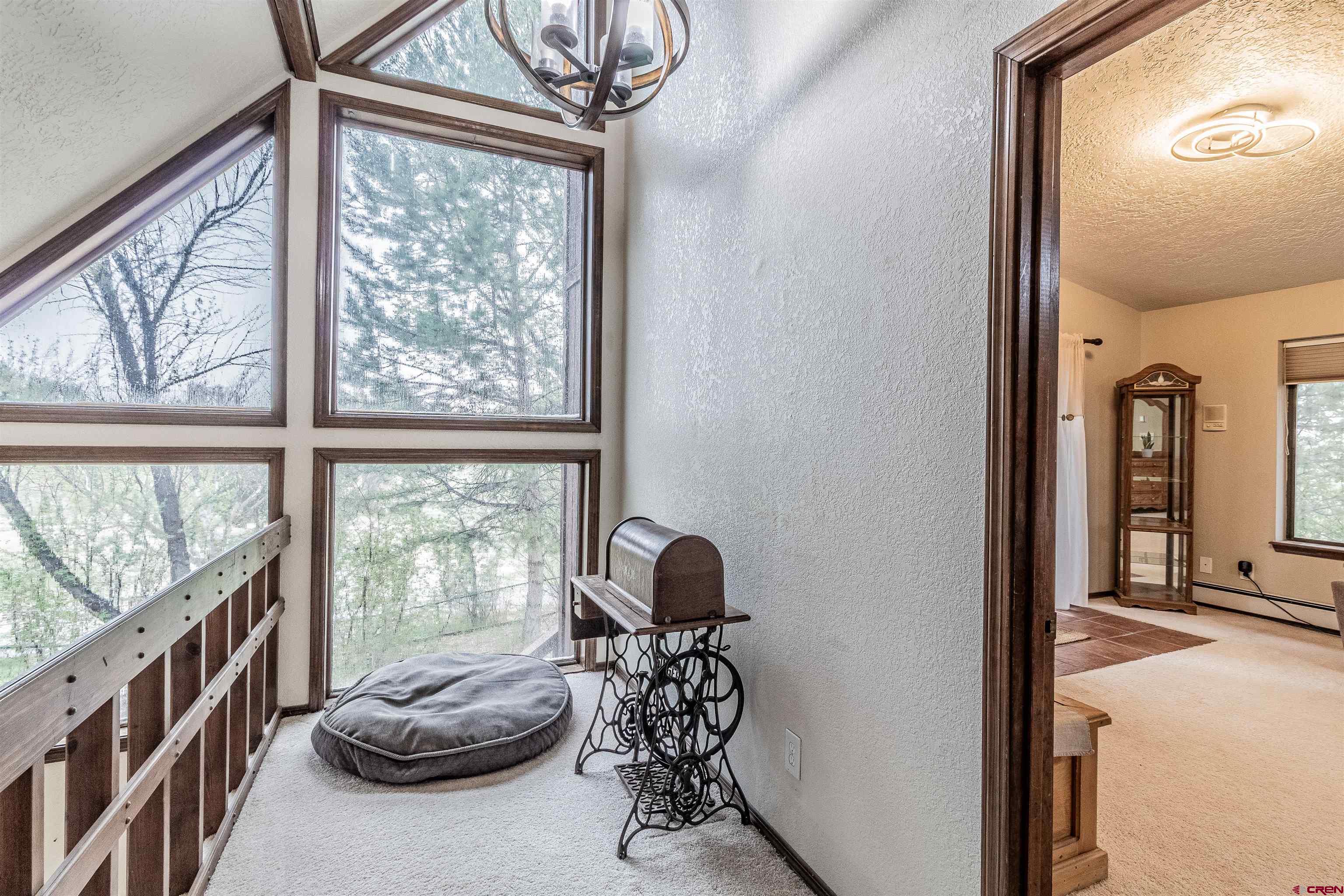27 Road 3025 Aztec, NM 87410 - Photo 26 of 45 a view of a livingroom with furniture and a window