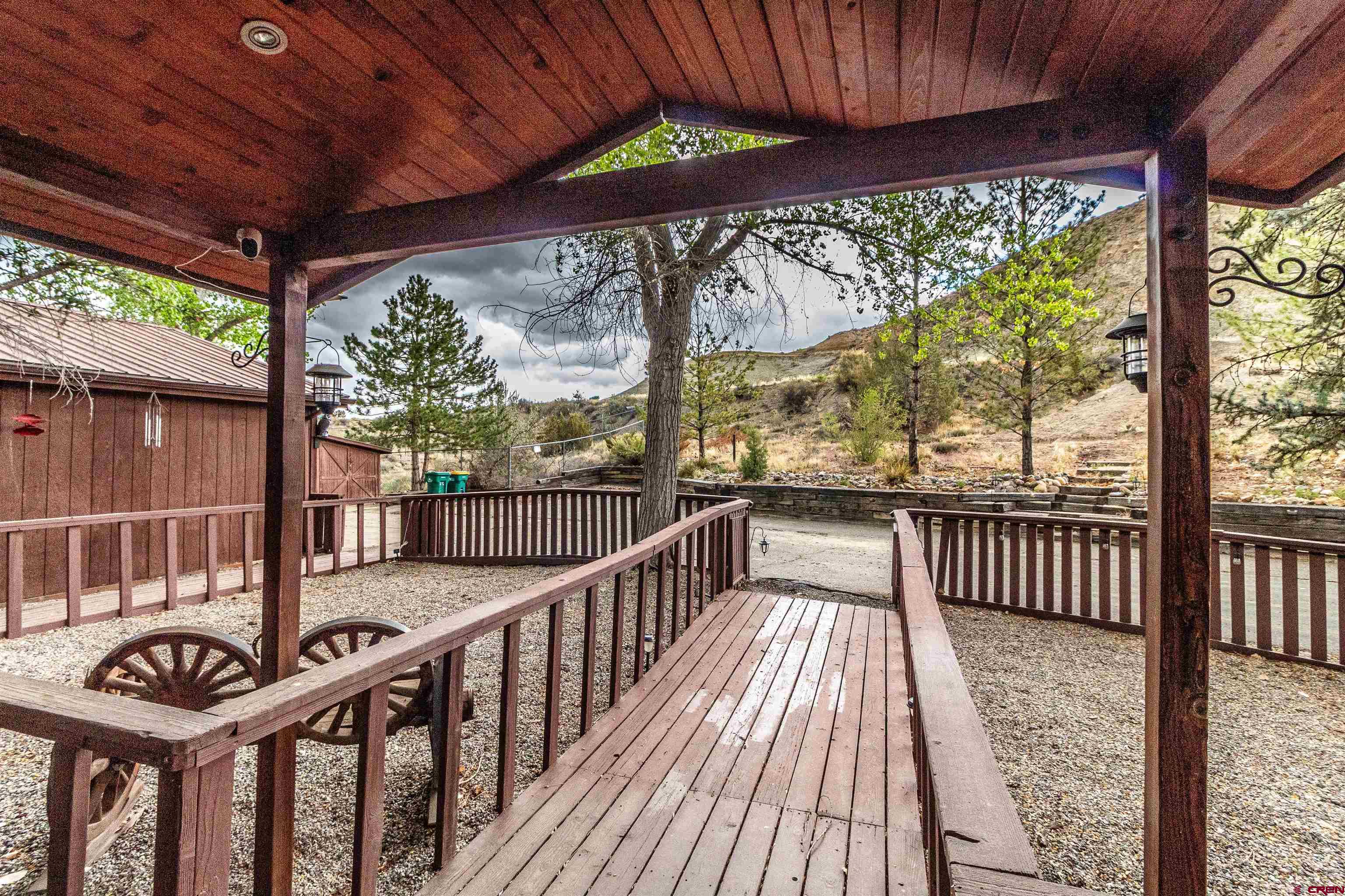 27 Road 3025 Aztec, NM 87410 - Photo 43 of 45 a view of a porch with wooden floor