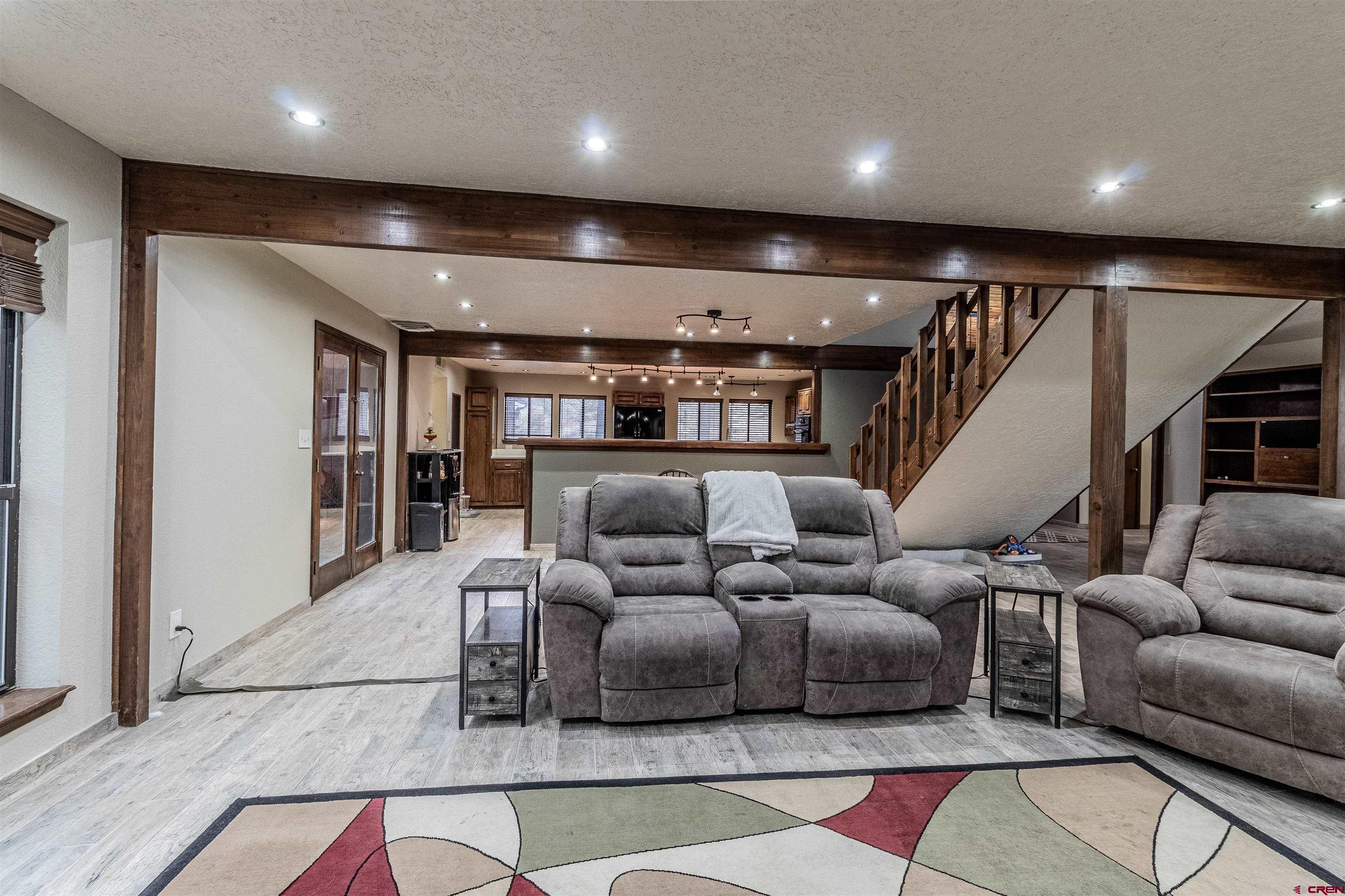 27 Road 3025 Aztec, NM 87410 - Photo 9 of 45 a living room with furniture and view of kitchen