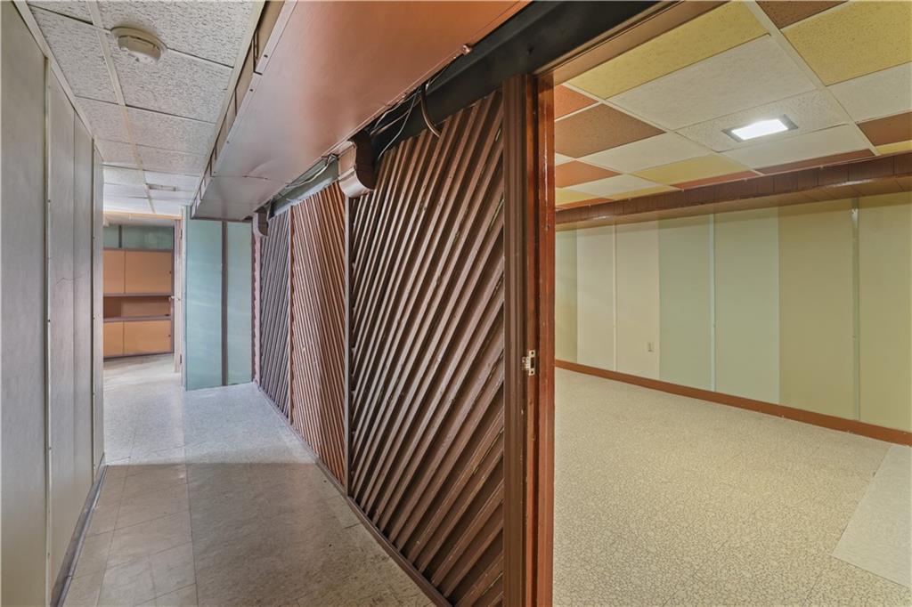 1027 Glass Run Road Pittsburgh, PA 15236 - Photo 16 of 24 a view of a hallway with wooden floor