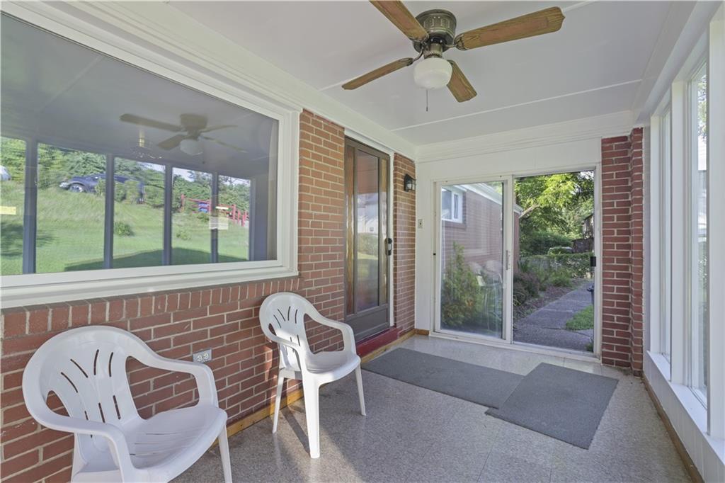 1027 Glass Run Road Pittsburgh, PA 15236 - Photo 5 of 24 a bedroom with a bed and wooden floor