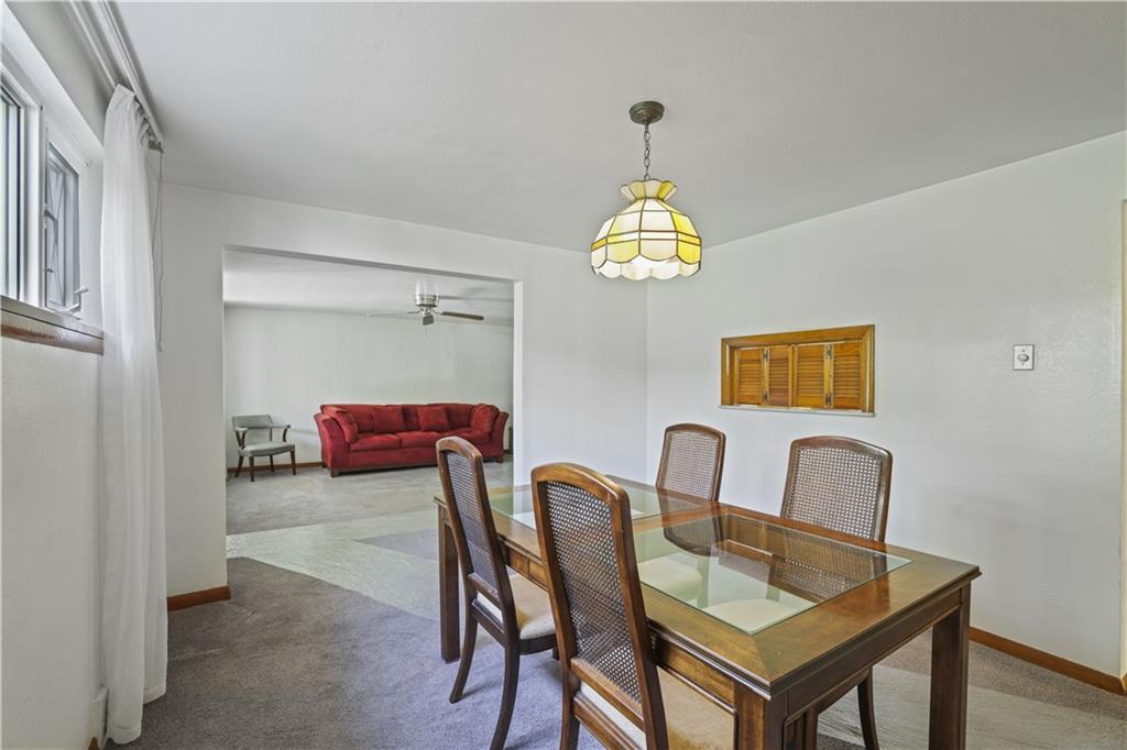 1027 Glass Run Road Pittsburgh, PA 15236 - Photo 8 of 24 a view of a dining room that has a table and chairs