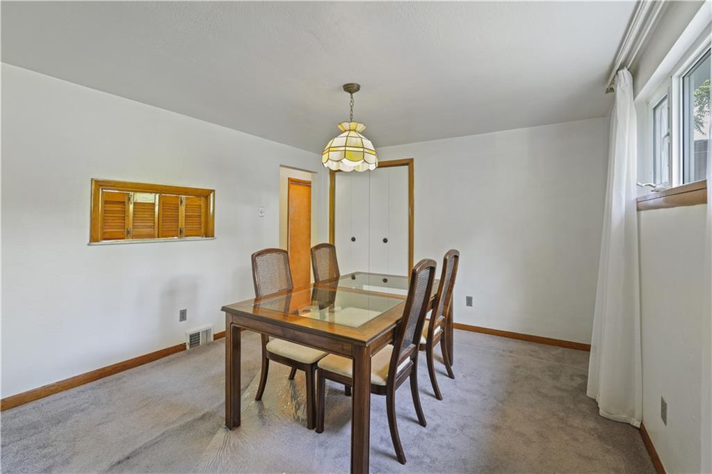 1027 Glass Run Road Pittsburgh, PA 15236 - Photo 9 of 24 a dining room with a table and chairs