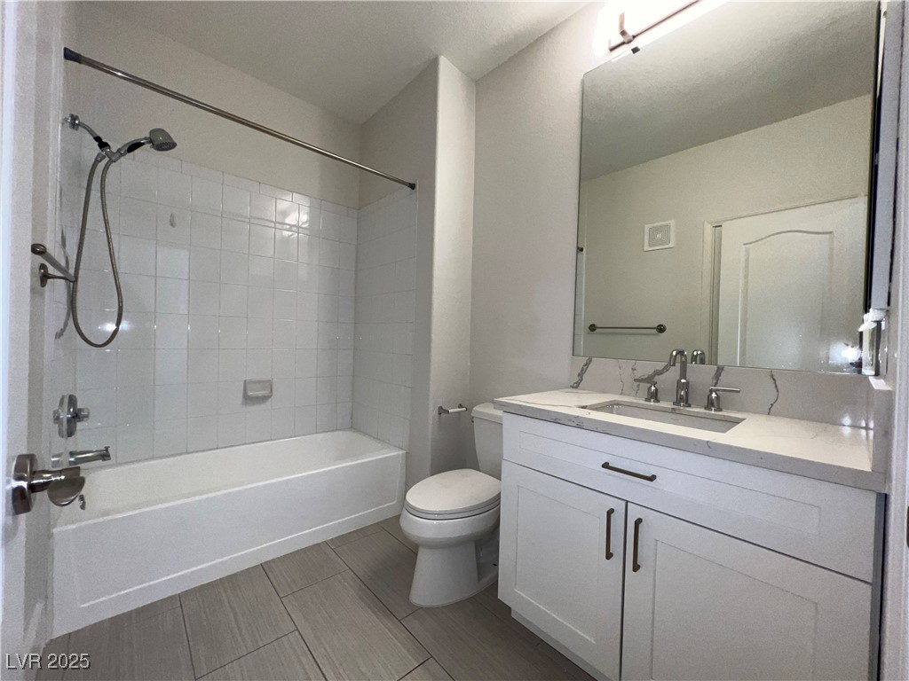 1705 King James Street, Unit 203 Las Vegas, NV 89144 - Photo 13 of 21 Full bath with tub / shower combination, vanity, and wood tiled floors