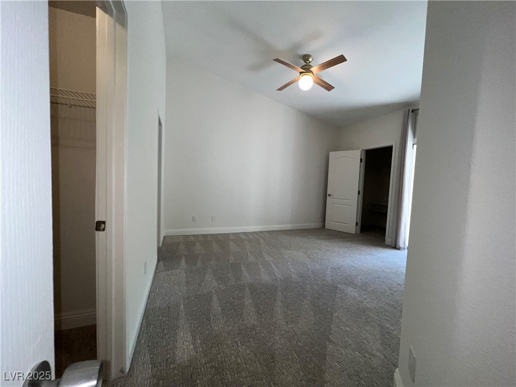 1705 King James Street, Unit 203 Las Vegas, NV 89144 - Photo 15 of 21 Unfurnished bedroom with carpet floors and a ceiling fan