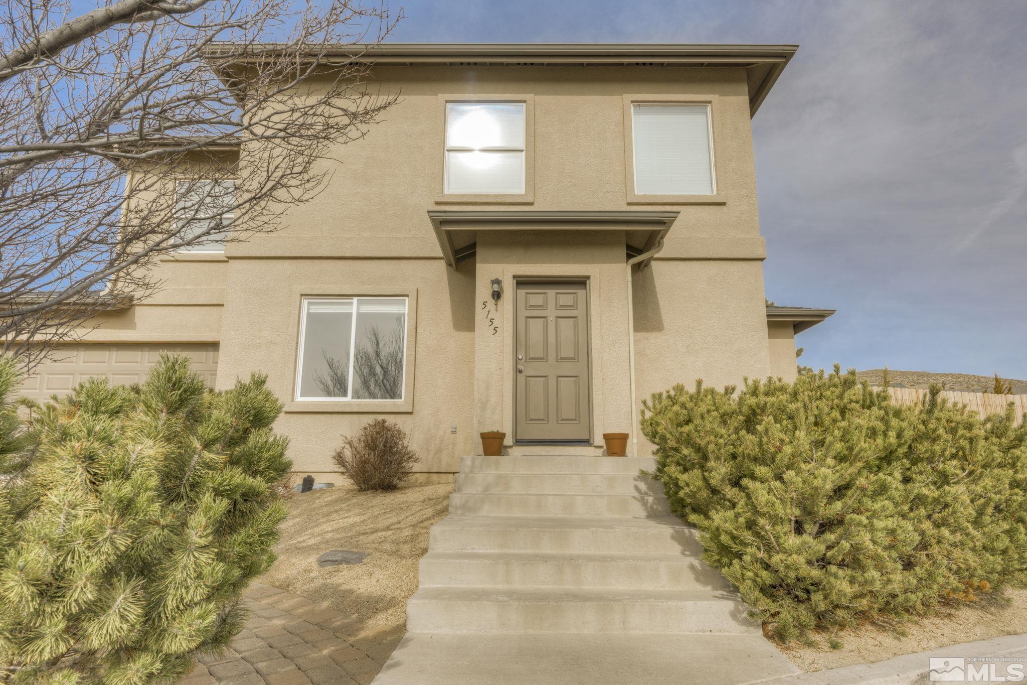 5155 Emery Drive Reno, NV 89506 - Photo 3 of 38 a front view of a house having yard