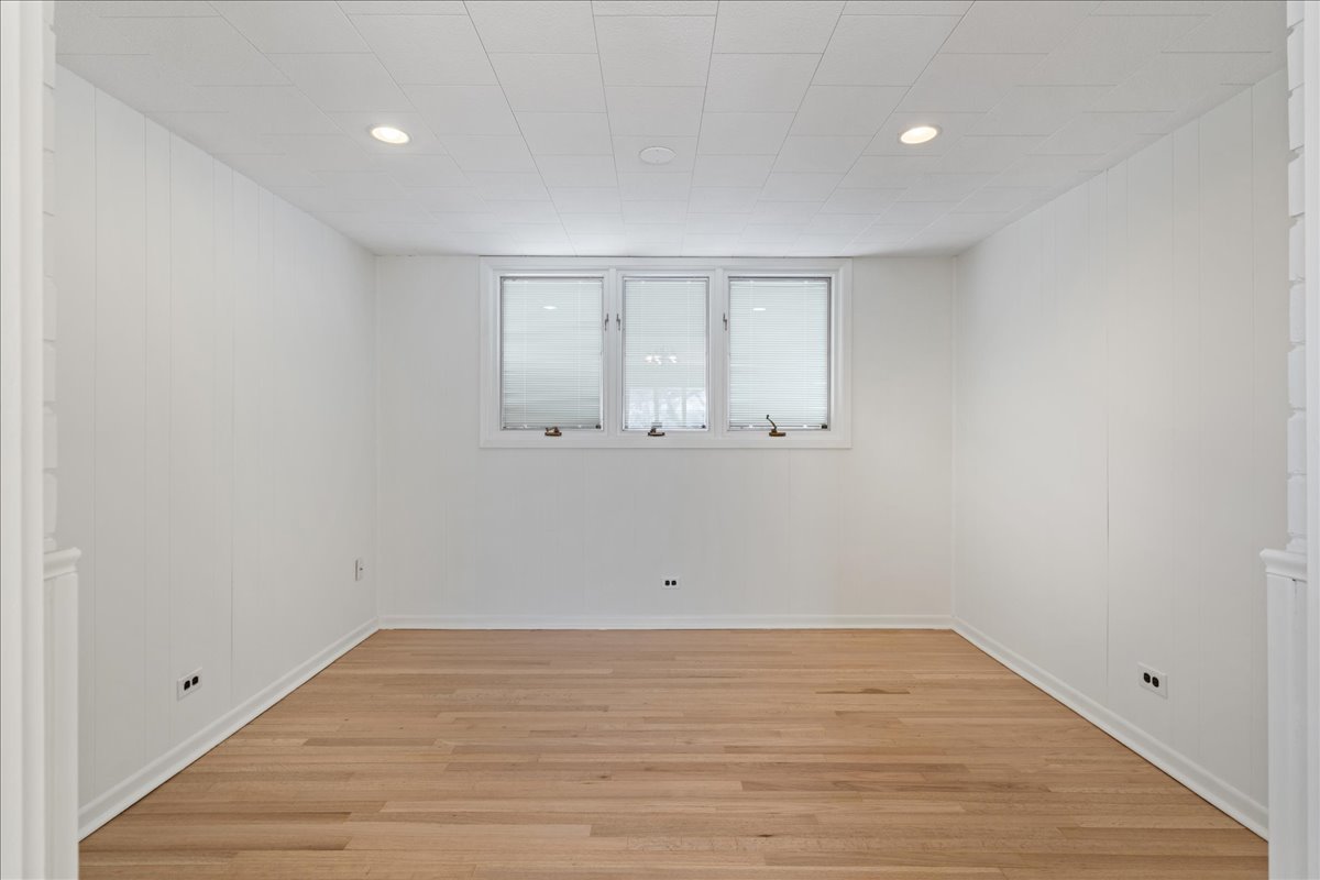 8314 Gross Point Road Morton Grove, IL 60053 - Photo 17 of 28 a view of empty room with wooden floor