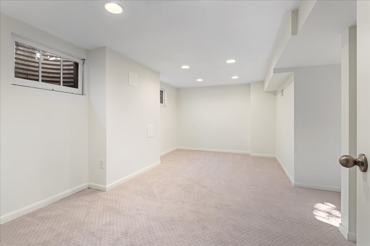 8314 Gross Point Road Morton Grove, IL 60053 - Photo 19 of 28 a view of an empty room with a window