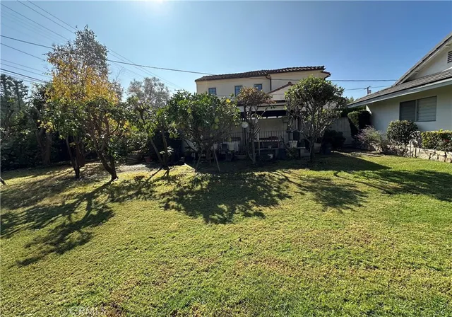 a view of a back yard of the house
