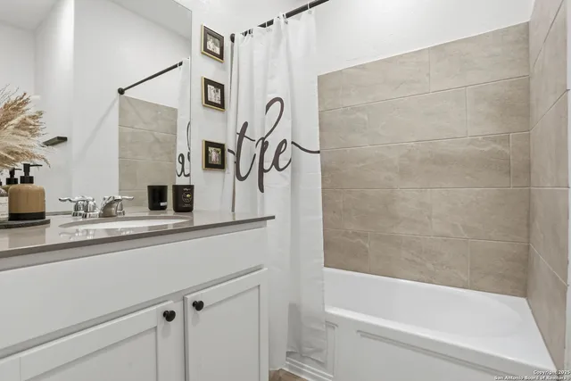 a bathroom with a sink and a bathtub