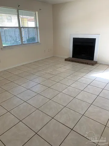 a bathroom with a toilet a sink and a mirror