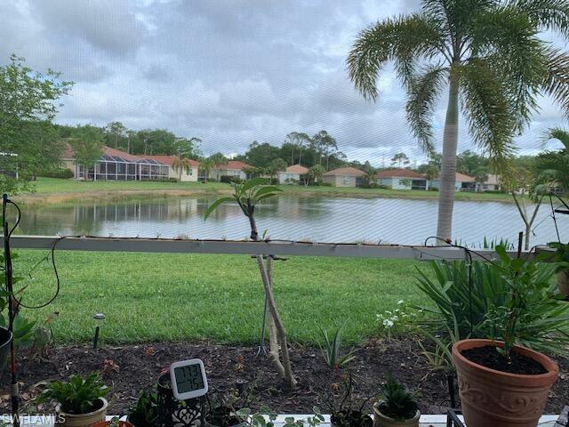 2190 Summersweet Drive Alva, FL 33920 - Photo 14 of 14 a view of a lake with a house in the background