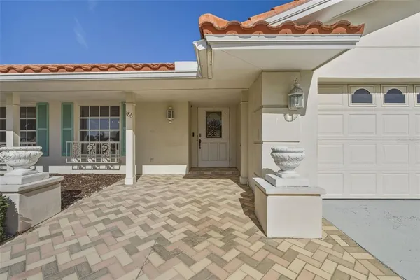 a view of a livingroom with furniture and a window