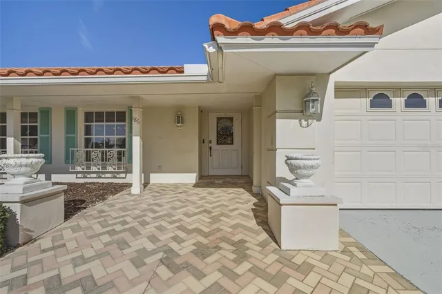a view of a livingroom with furniture and a window