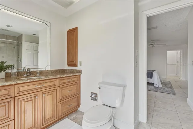 a view of a swimming pool with a table and chairs