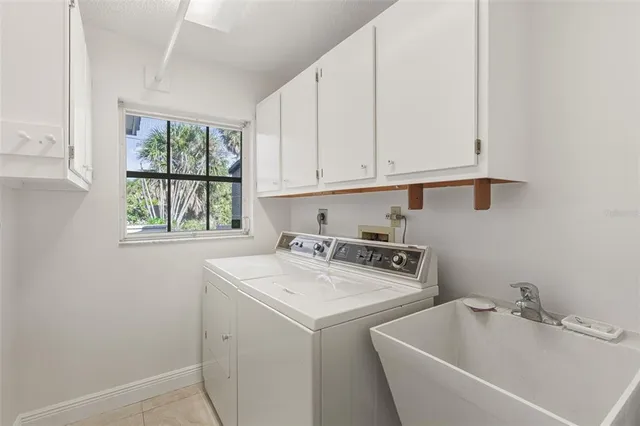 an aerial view of residential houses with city view