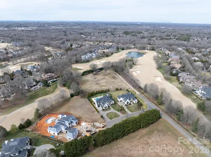 an aerial view of a city with lots of residential buildings
