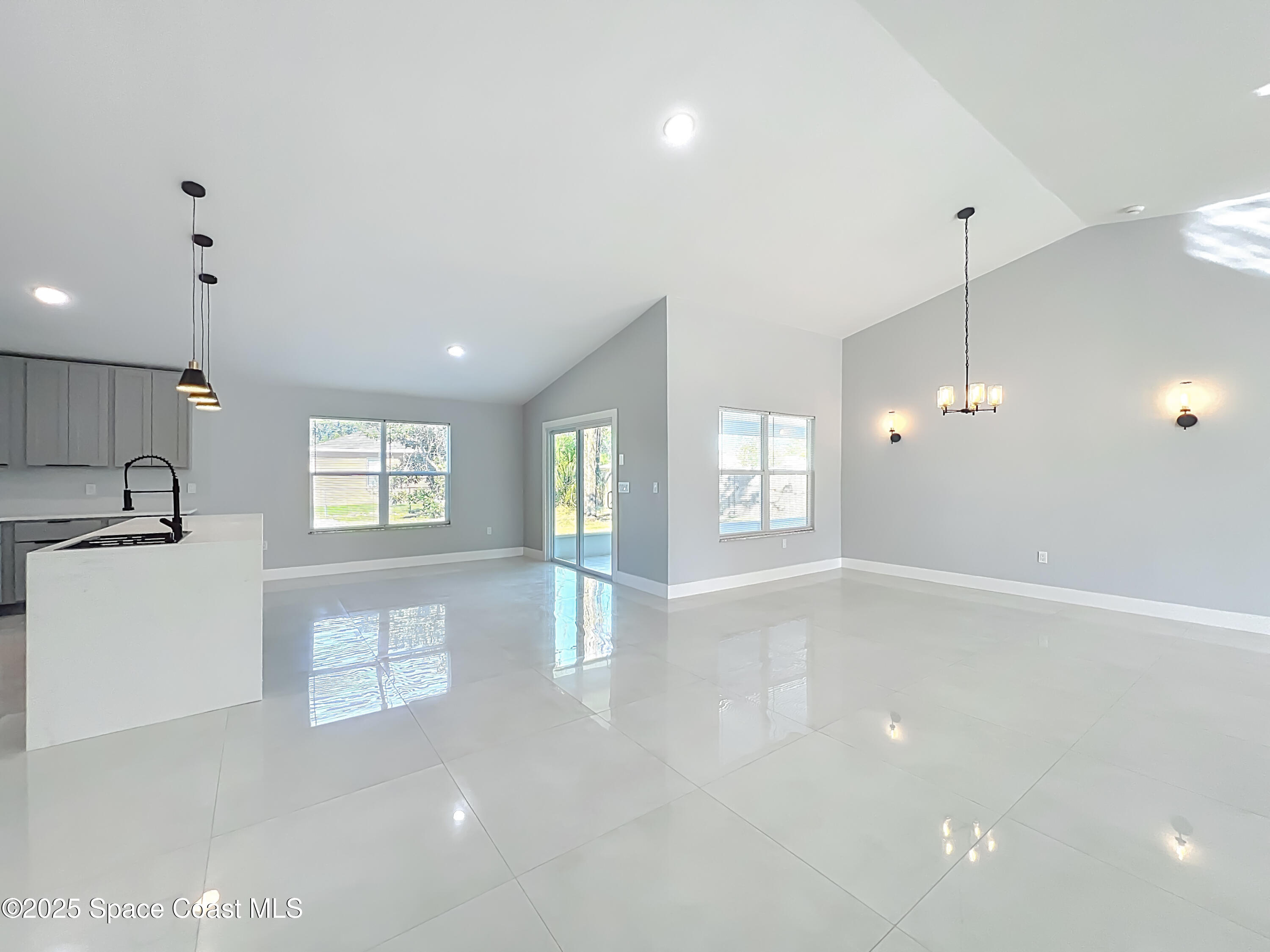 1911 Academy Street Northeast Palm Bay, FL 32905 - Photo 14 of 65 a view of an empty room with a window