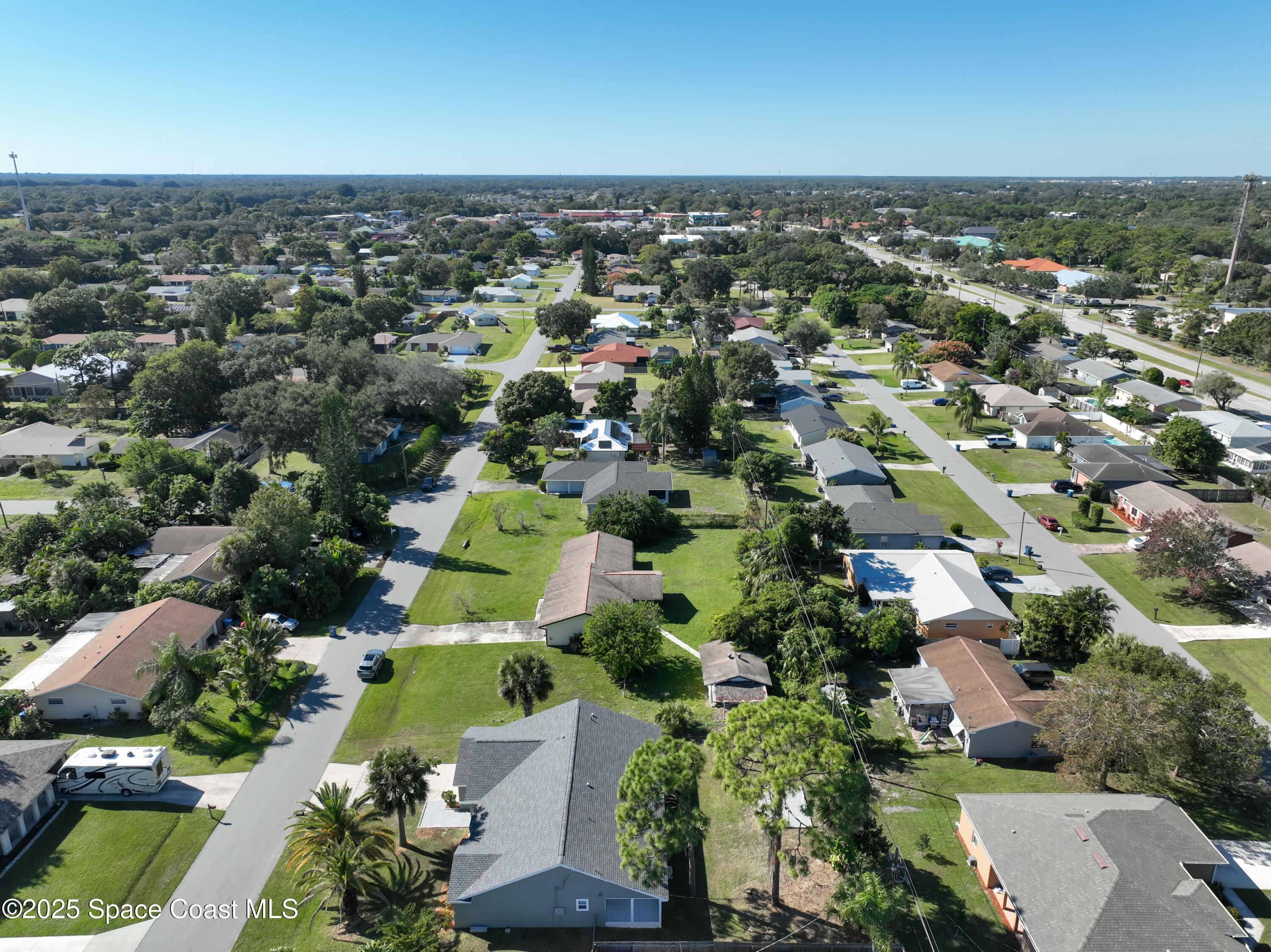 1911 Academy Street Northeast Palm Bay, FL 32905 - Photo 56 of 65 an aerial view of multiple house