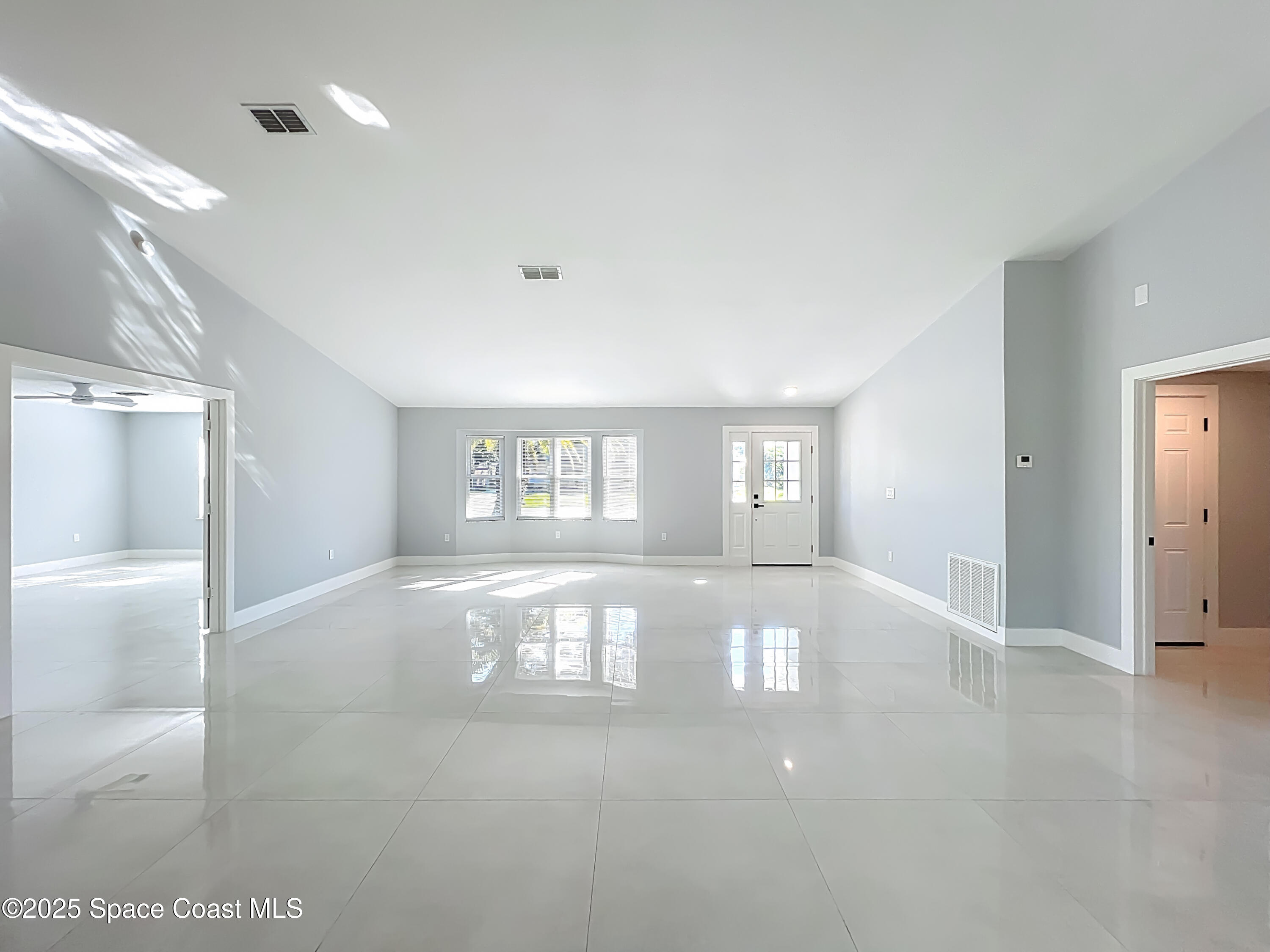 1911 Academy Street Northeast Palm Bay, FL 32905 - Photo 10 of 65 a view of livingroom and window