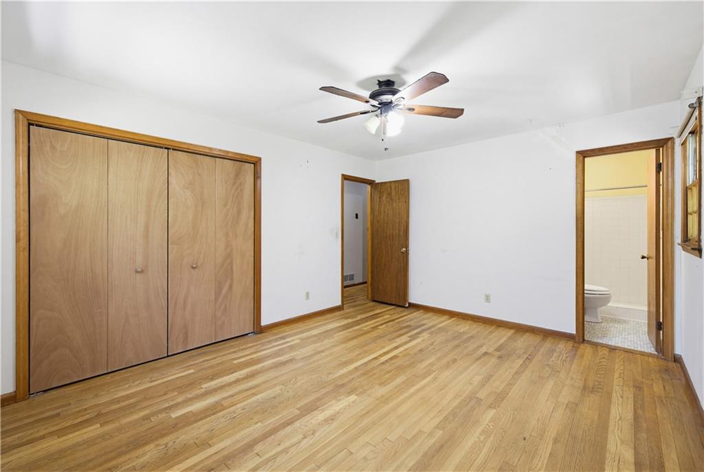 4188 Cedar Valley Lane Conley, GA 30288 - Photo 21 of 28 a view of an empty room with wooden floor