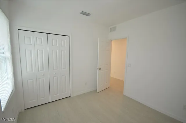 an empty room with a door