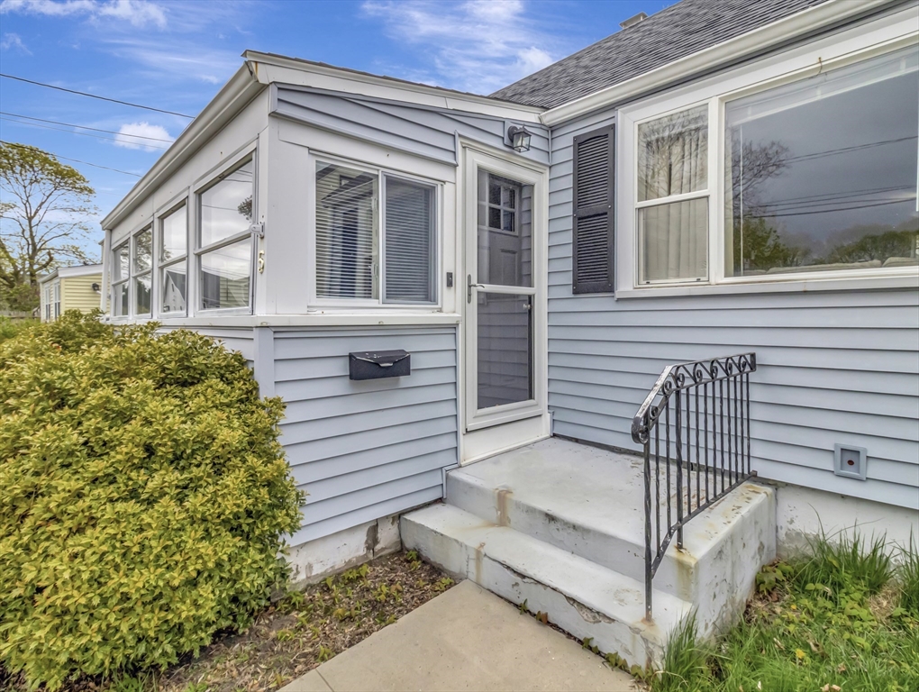 5 G Street Hull, MA 02045 - Photo 8 of 41 a view of a house with a small yard and wooden floor and fence