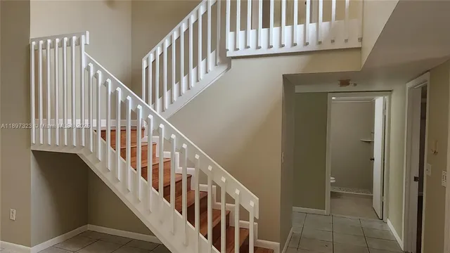 a view of an empty room with empty room