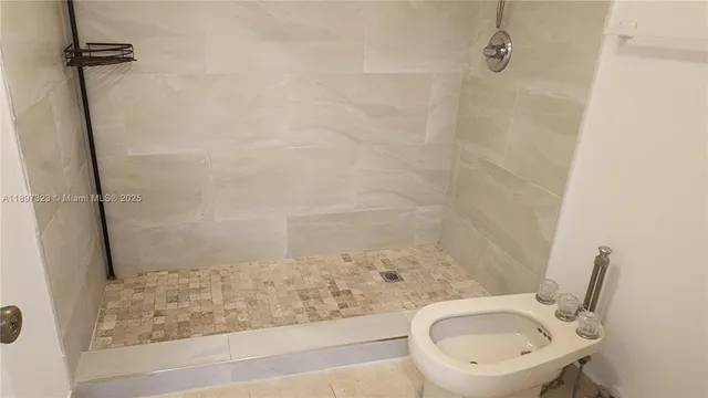 a spacious bathroom with a double vanity sink a mirror and a bathtub