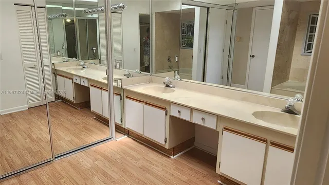 a view of a small space with wooden floor