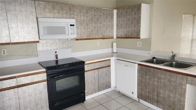 a view of a garage with stairs