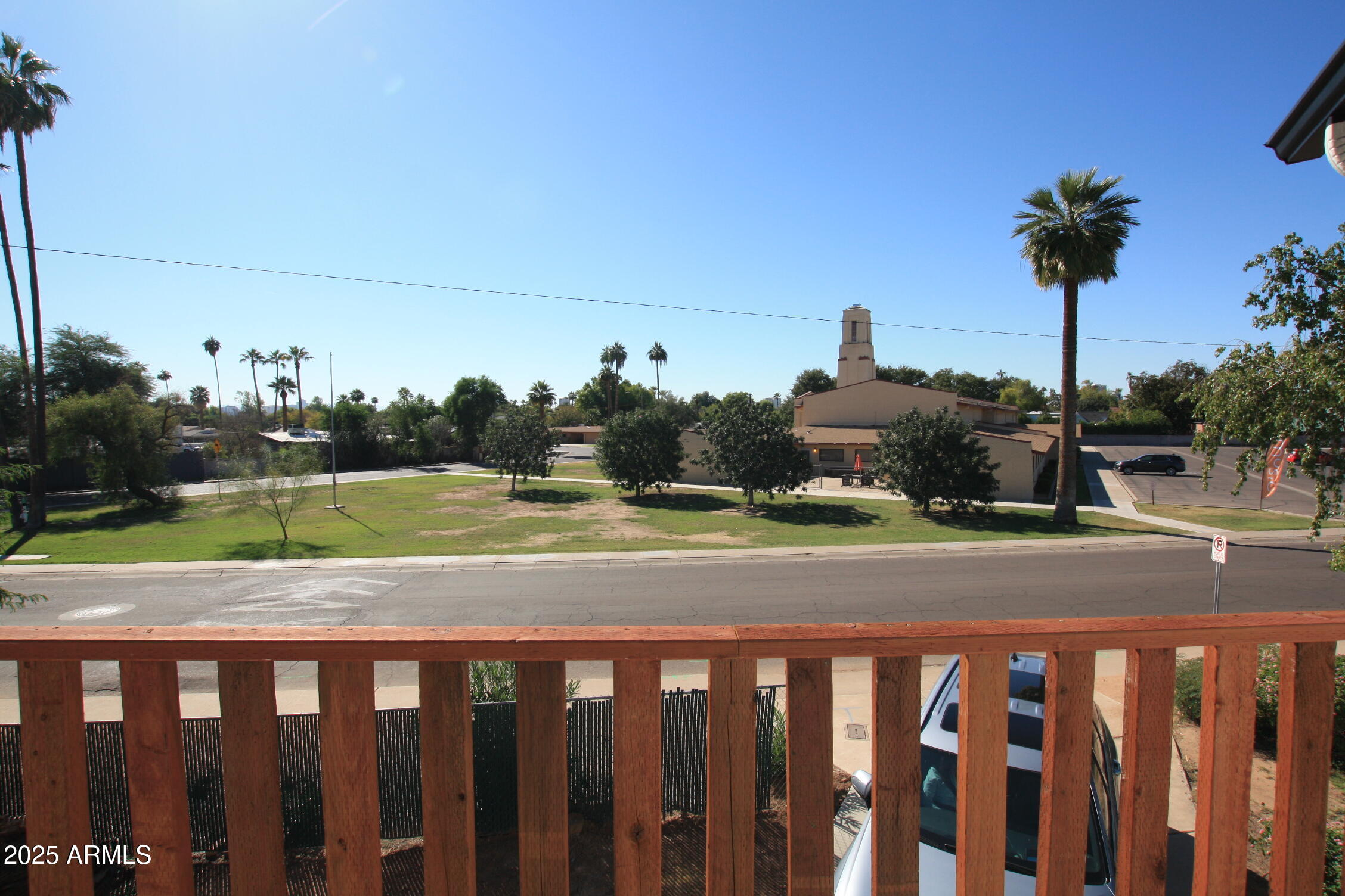 1333 East Flower Street, Unit REAR Phoenix, AZ 85014 - Photo 30 of 34 a view of a yard and dinning table and chairs