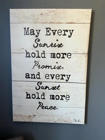 a view of an empty room with windows