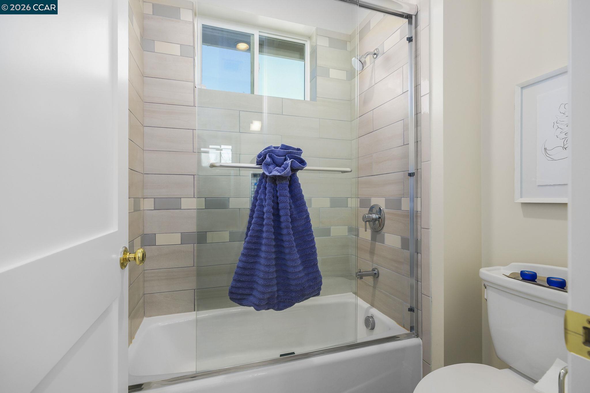 208 Valley View Place El Sobrante, CA 94803 - Photo 13 of 31 a bathroom with a bathtub and a shower