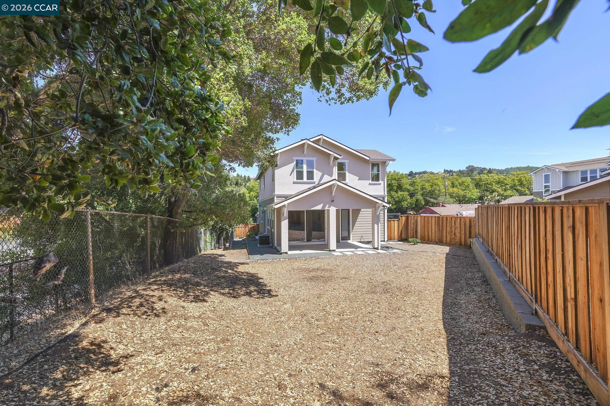 208 Valley View Place El Sobrante, CA 94803 - Photo 17 of 31 a front view of a house with a yard