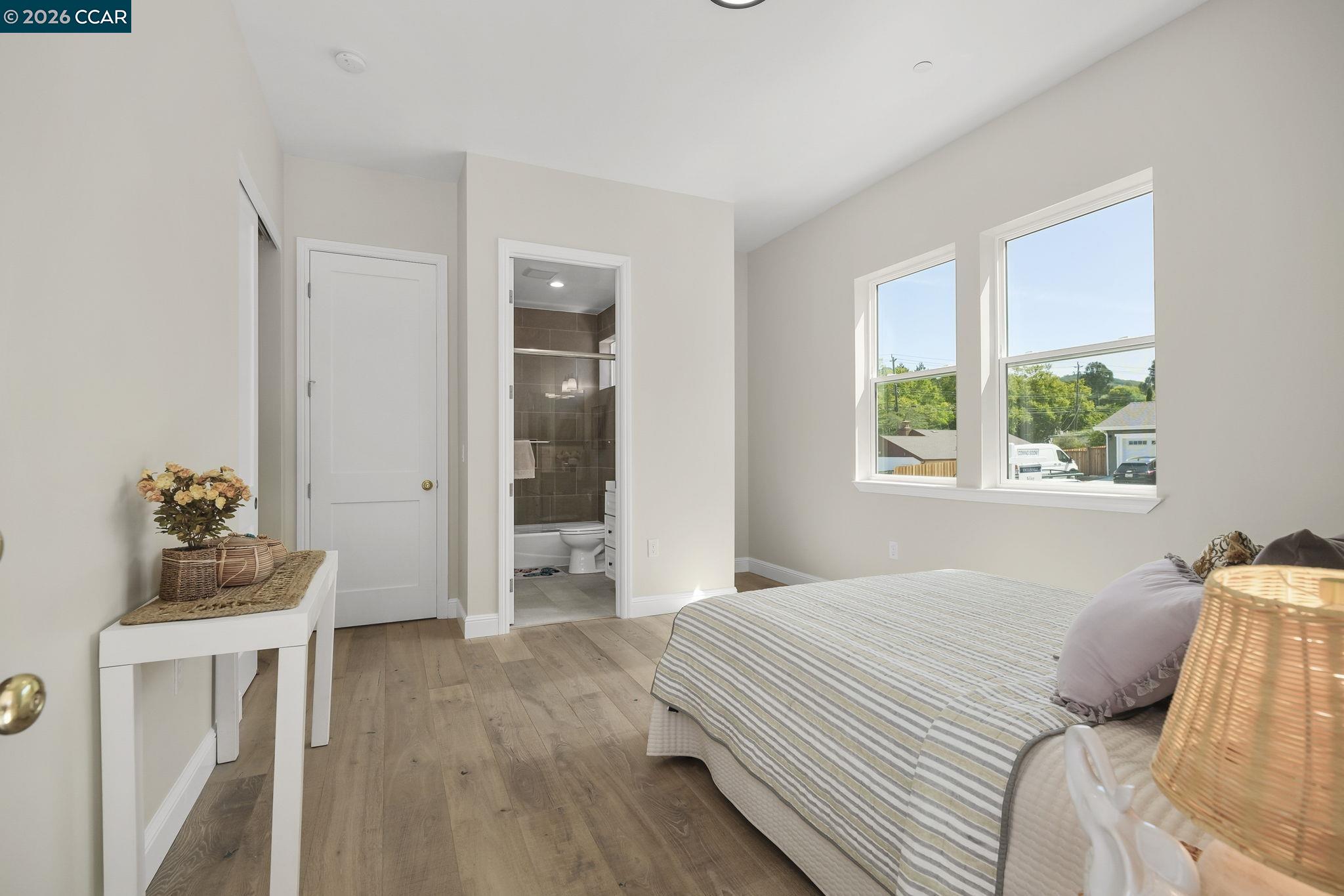 208 Valley View Place El Sobrante, CA 94803 - Photo 22 of 31 a bedroom with a bed and a window