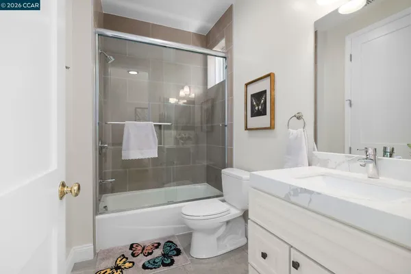 a bathroom with a toilet a sink and a bathtub
