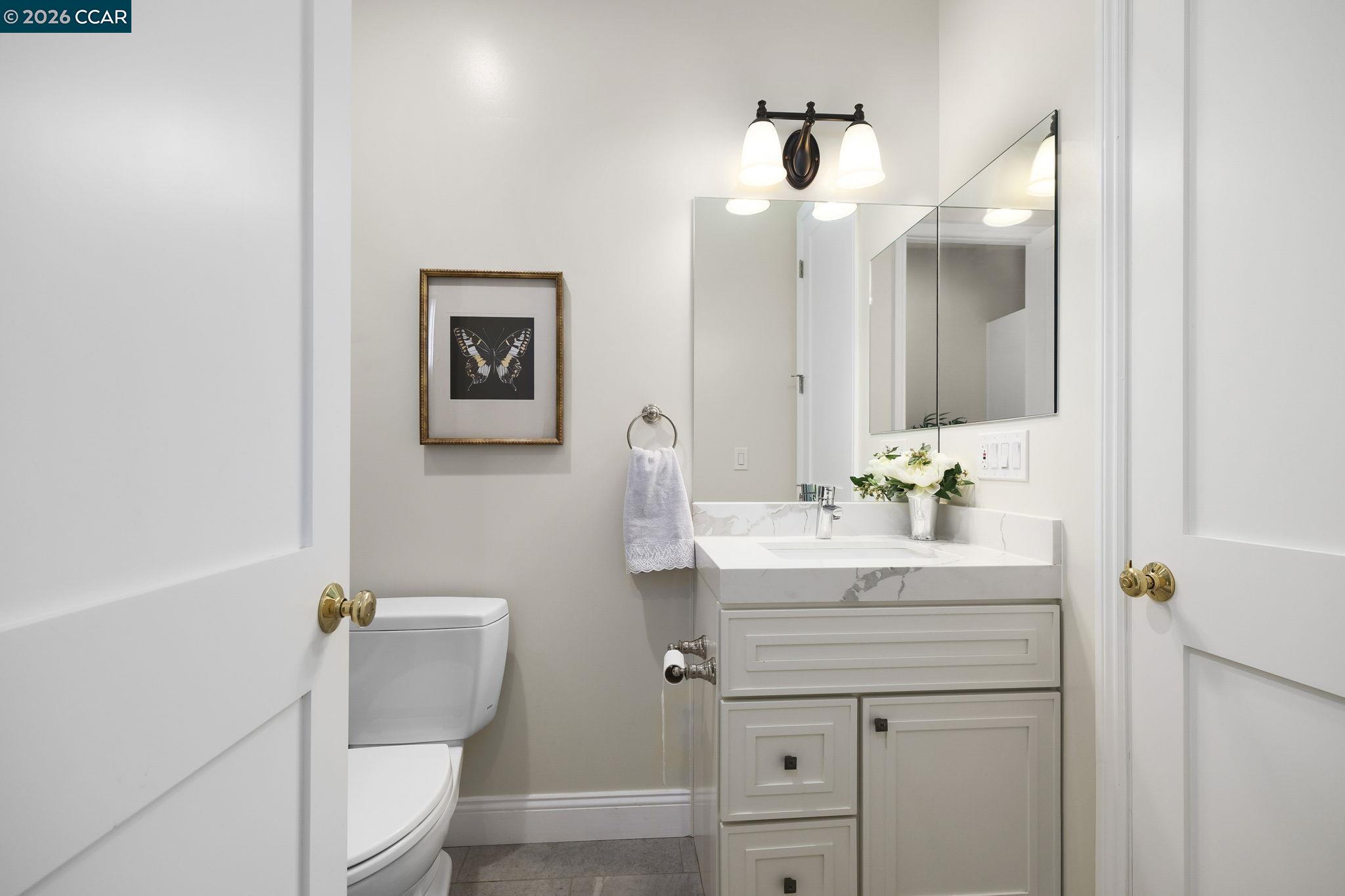 208 Valley View Place El Sobrante, CA 94803 - Photo 24 of 31 a bathroom with a sink vanity granite and toilet