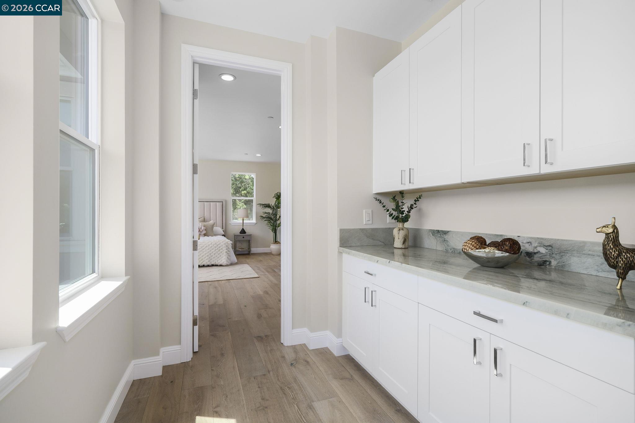 208 Valley View Place El Sobrante, CA 94803 - Photo 25 of 31 a kitchen with sink and cabinets
