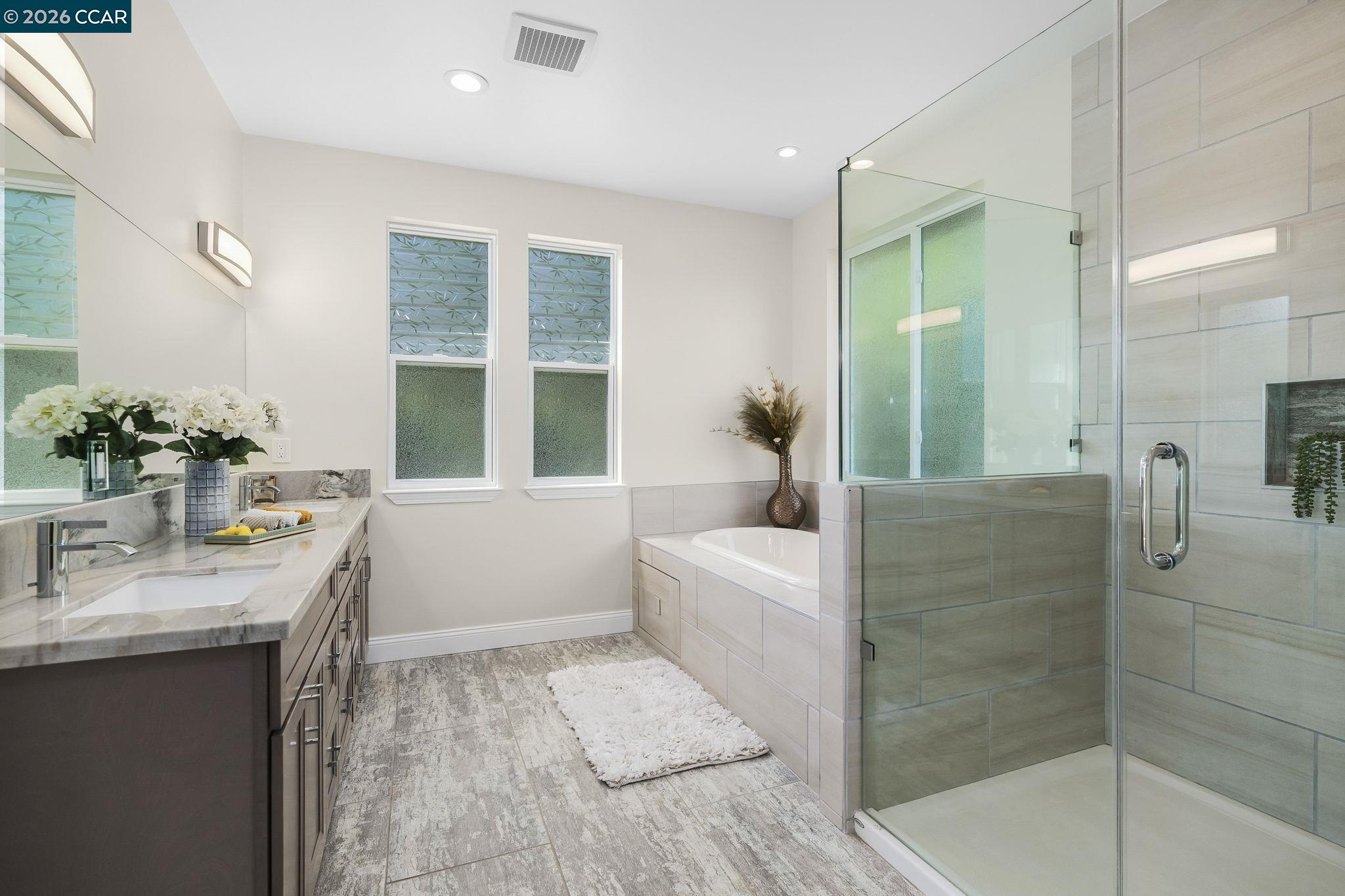 208 Valley View Place El Sobrante, CA 94803 - Photo 28 of 31 a bathroom with a tub sink shower and mirror
