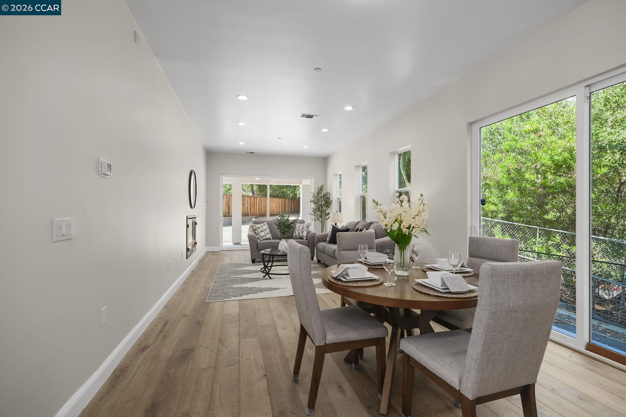 208 Valley View Place El Sobrante, CA 94803 - Photo 4 of 31 a view of a dining room with furniture and wooden floor