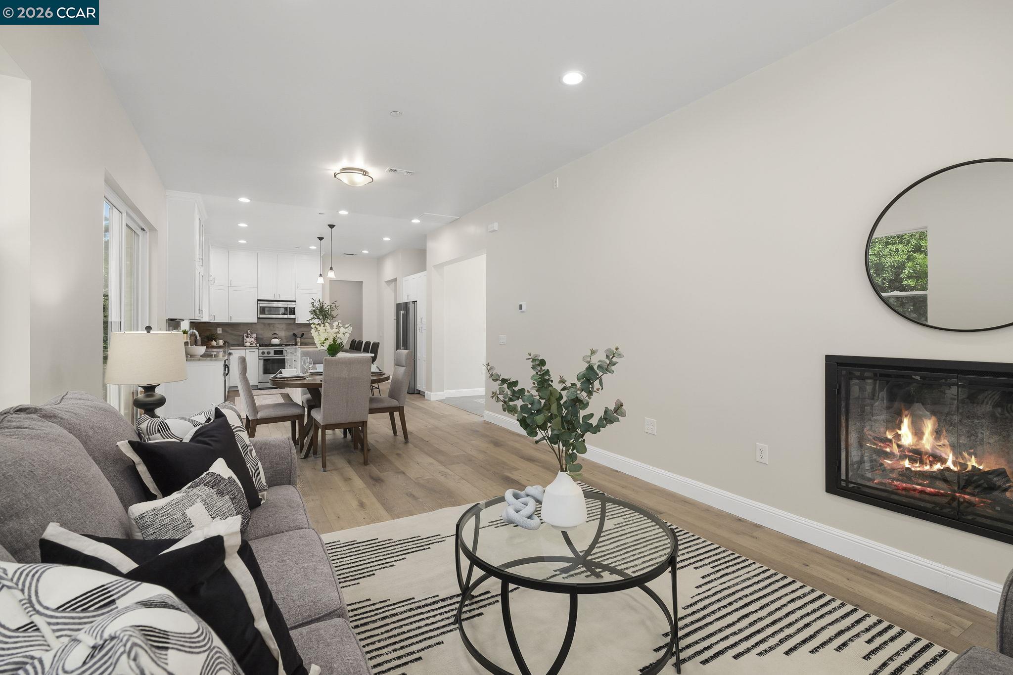 208 Valley View Place El Sobrante, CA 94803 - Photo 5 of 31 a living room with furniture a fireplace and a potted plant