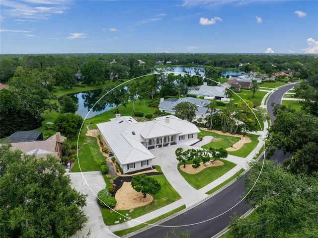 an aerial view of a house with garden