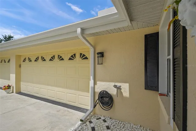 a view of a swimming pool with a lounge chair