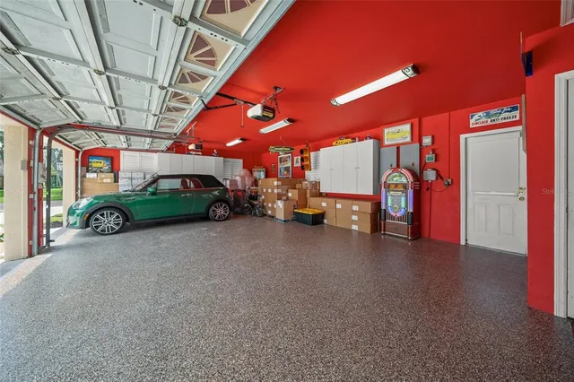 a front view of a house with swimming pool having outdoor seating