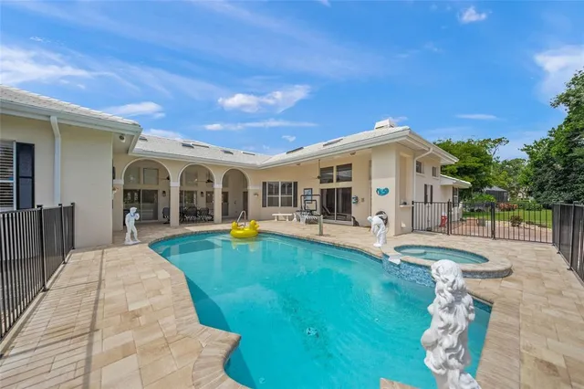 a garden view with a lake